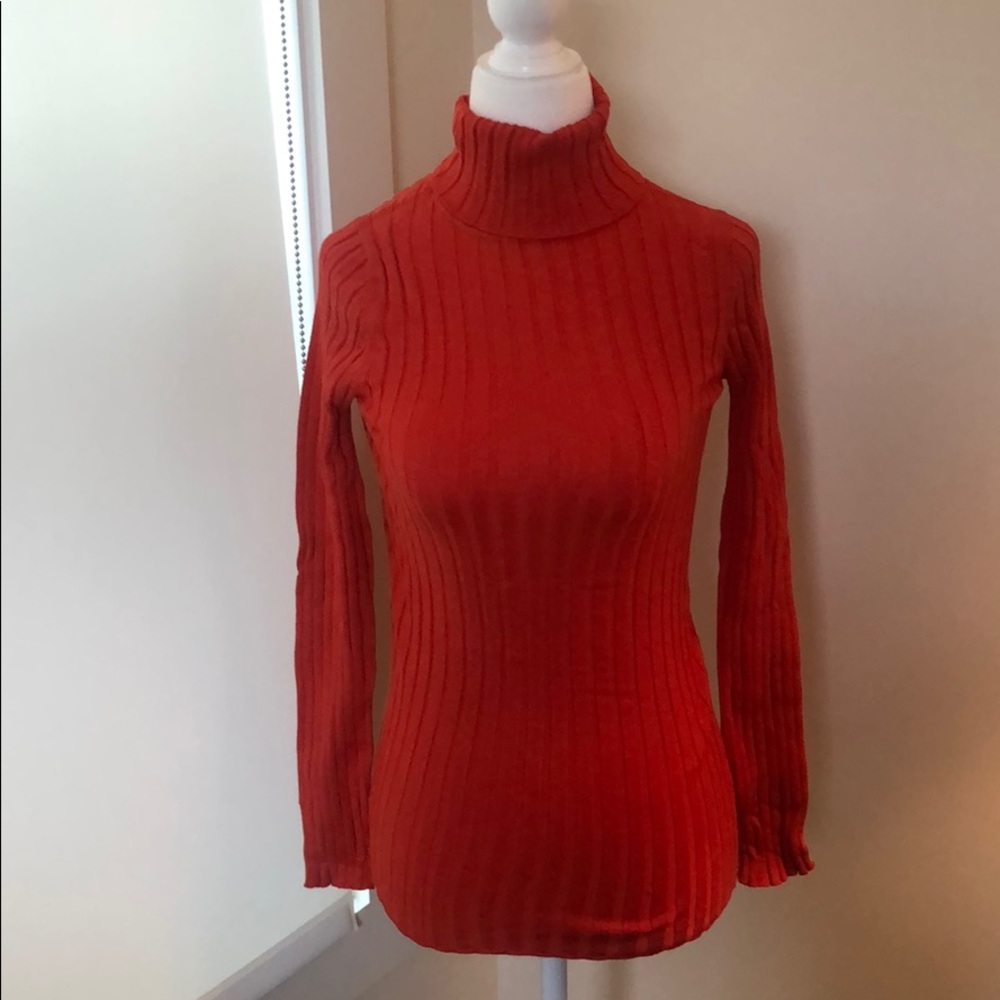 Bright orange turtleneck